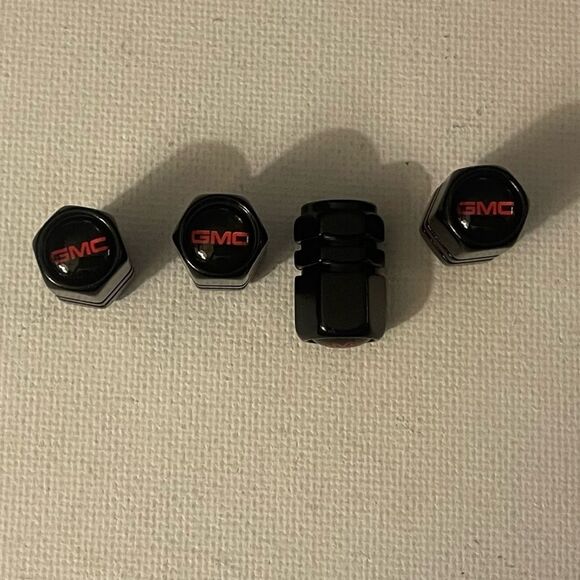 GMC Logo valve Stem caps in Black set of 4 NWT - Picture 1 of 4